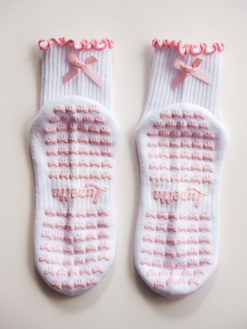 Back of Pink Ribbon grip socks