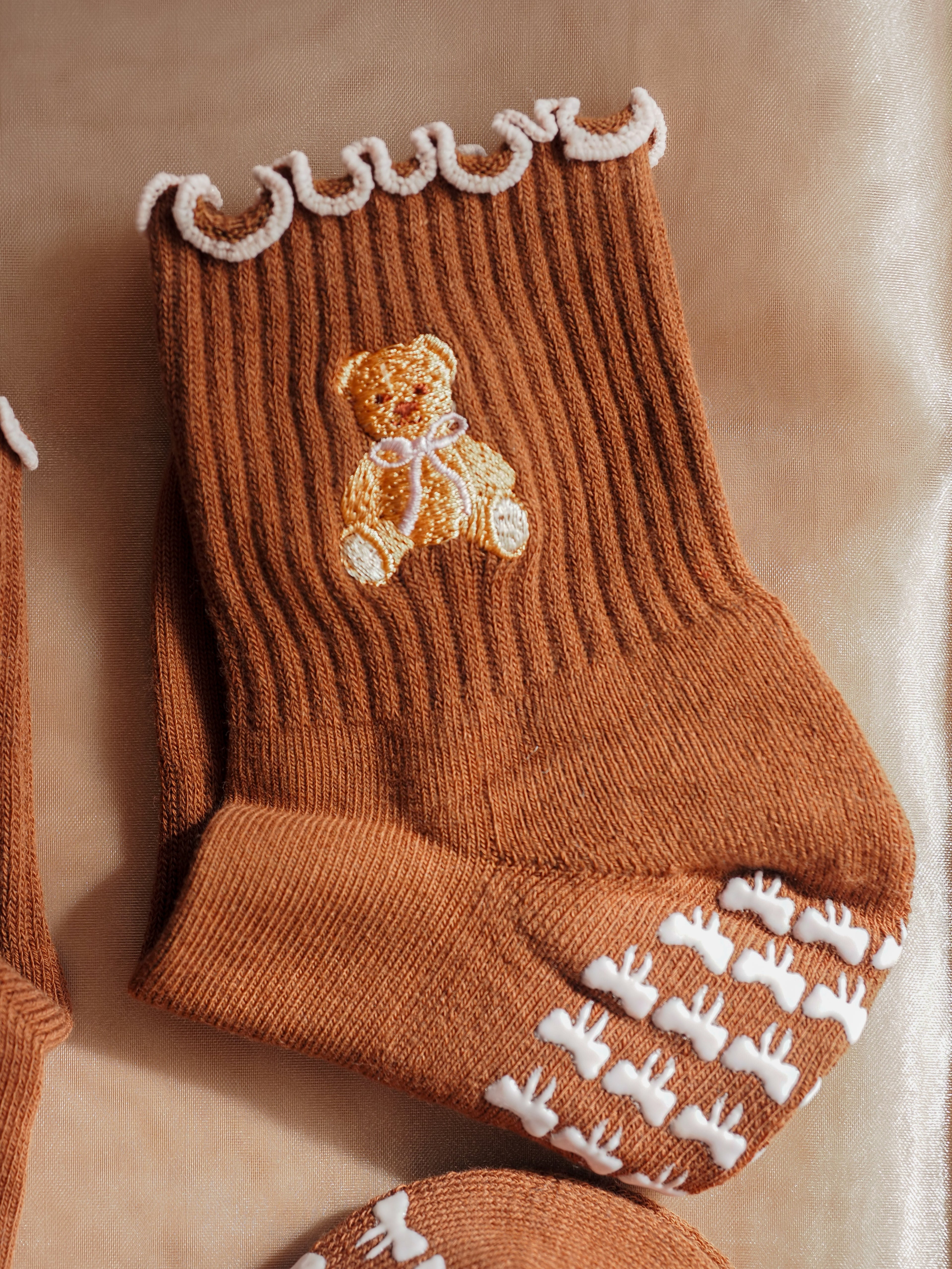 Close-up of Teddy Bear grip socks